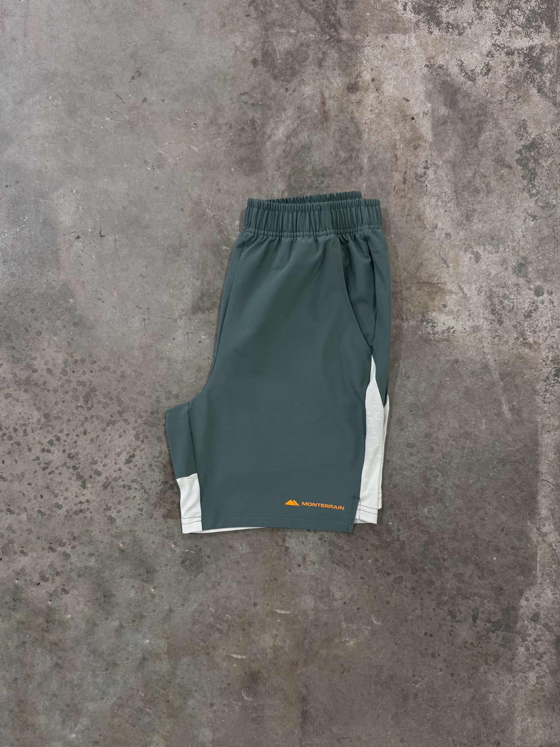 Monterrain Divide Woven Short - Escape Green / Stone from DripModa