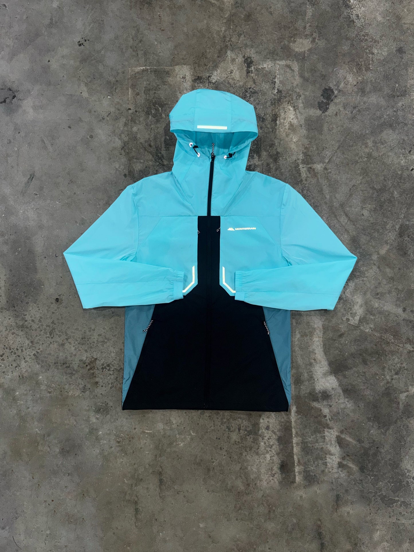 Monterrain Chase Windbreaker - Black / Gleaming Blue from DripModa