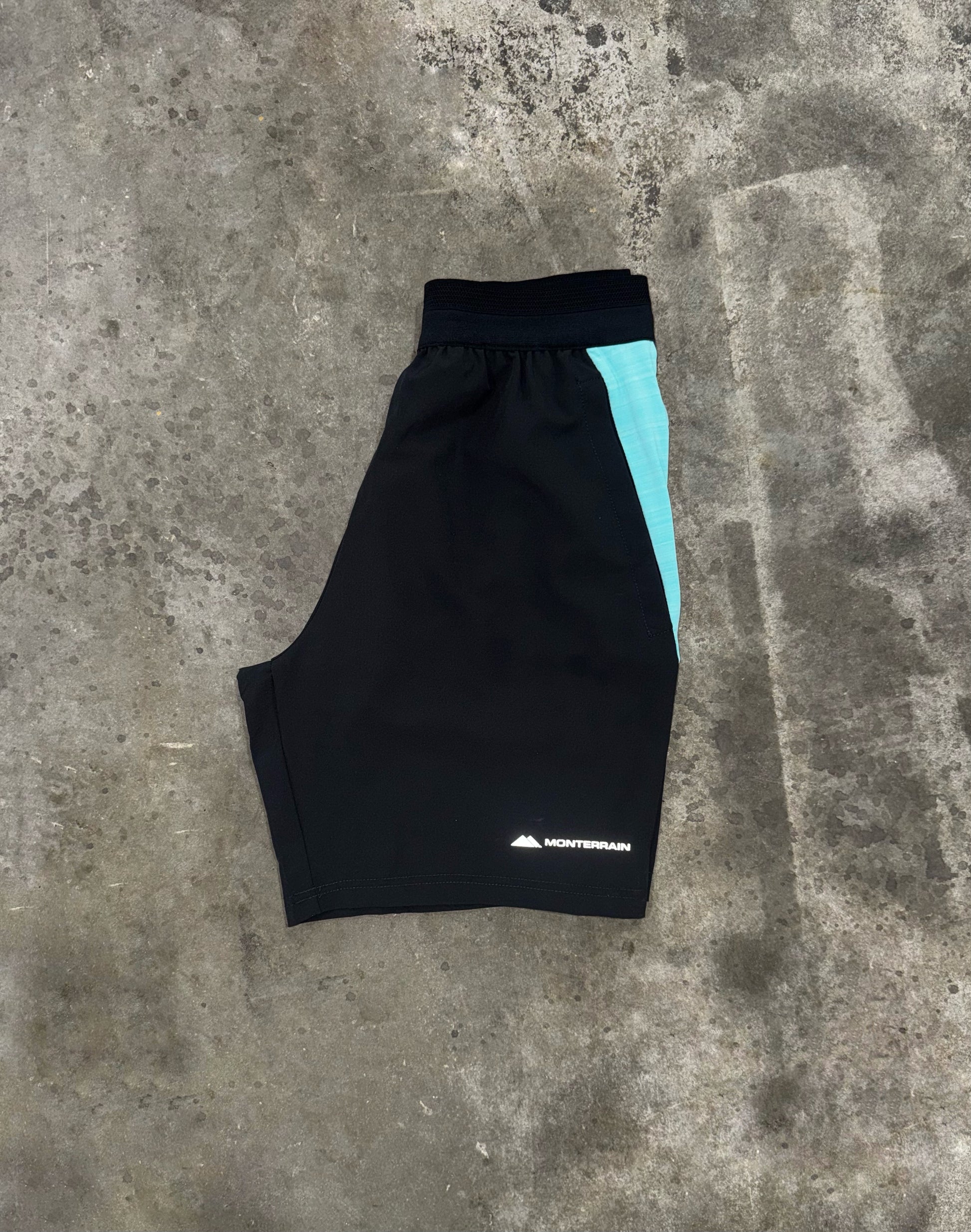 Monterrain Lyder Short - Black / Gleaming Blue from DripModa