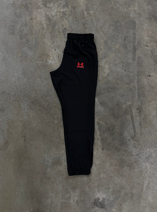 Under Armour Tech Sport Pant - Black / Red from DripModa