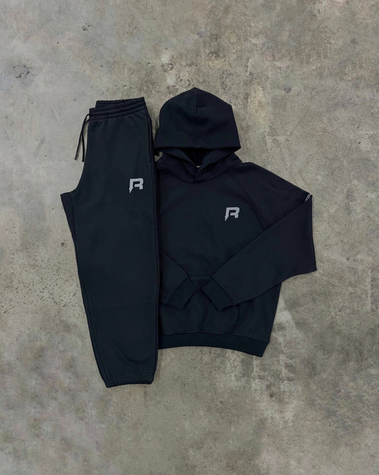 Reprimo Collective Black Tracksuit - Hoodie / Pant from DripModa