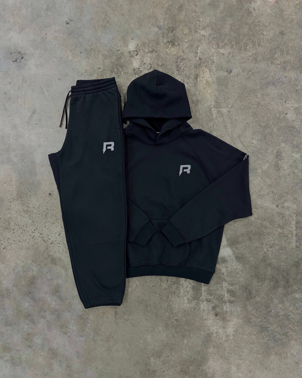 Reprimo Collective Black Tracksuit - Hoodie / Pant from DripModa